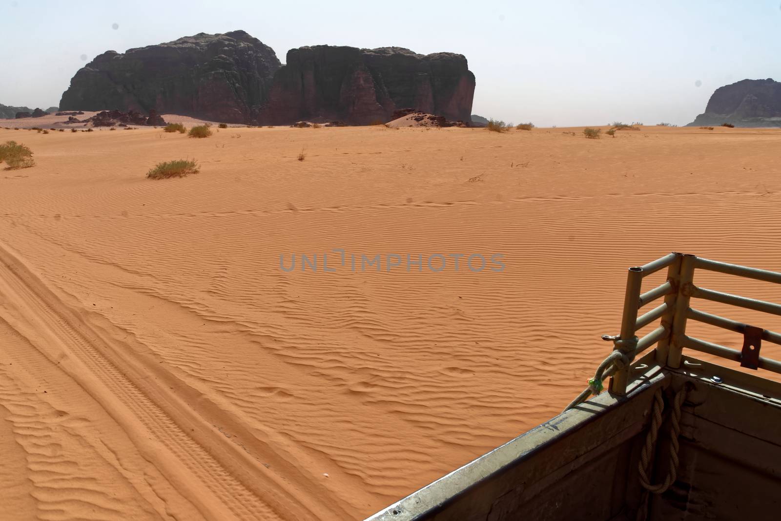 View from the platform of an off-road vehicle to the ripple marks in the desert sand of Wadi Rum, Jordan by geogif