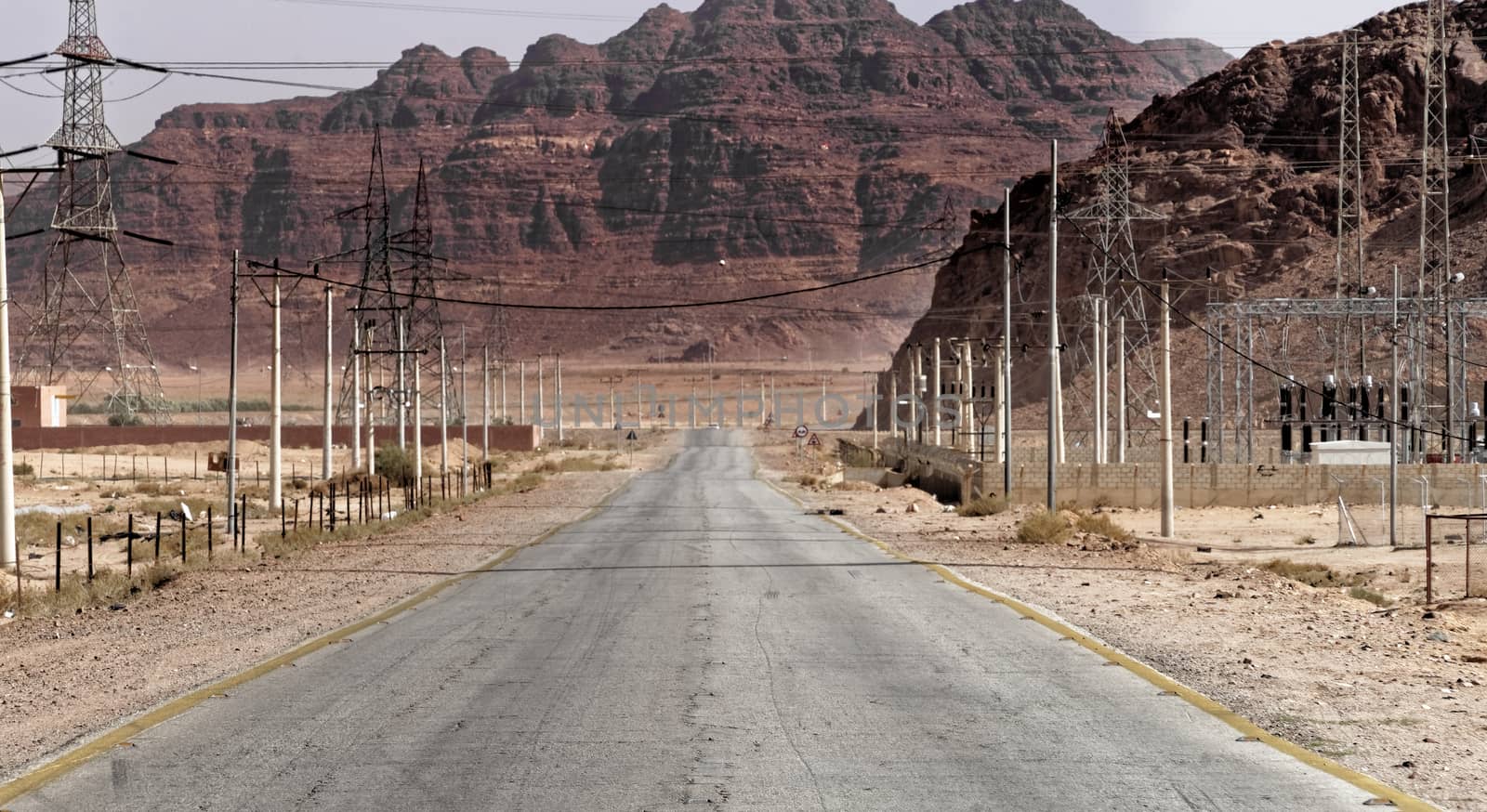 Junction of the road from the Desert Highway to Wadi Rum in the desert of Jordan, middle east