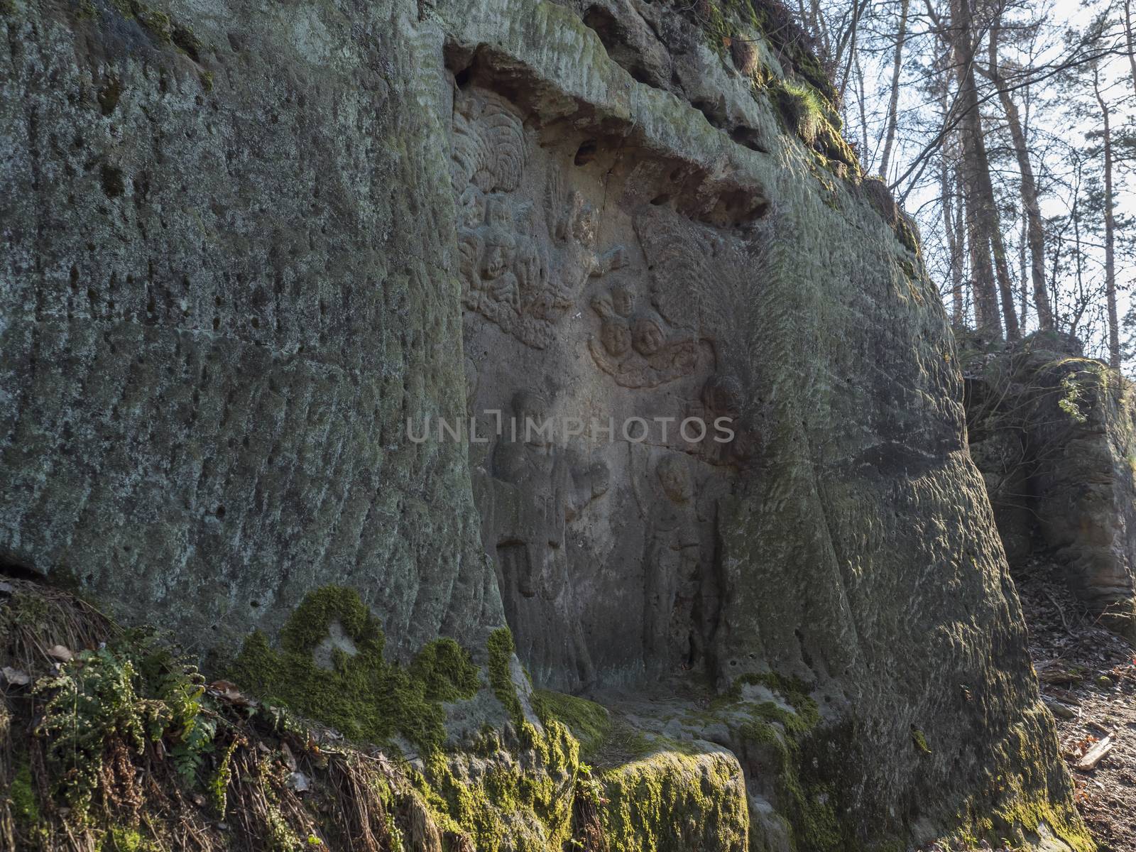 Relief Flight into Egypt sculpted to the sandstone rock in 1740 by joiner Franz Schier in forest near small village Marenicky in luzicke hory, Lusatian Mountains, early spring by Henkeova