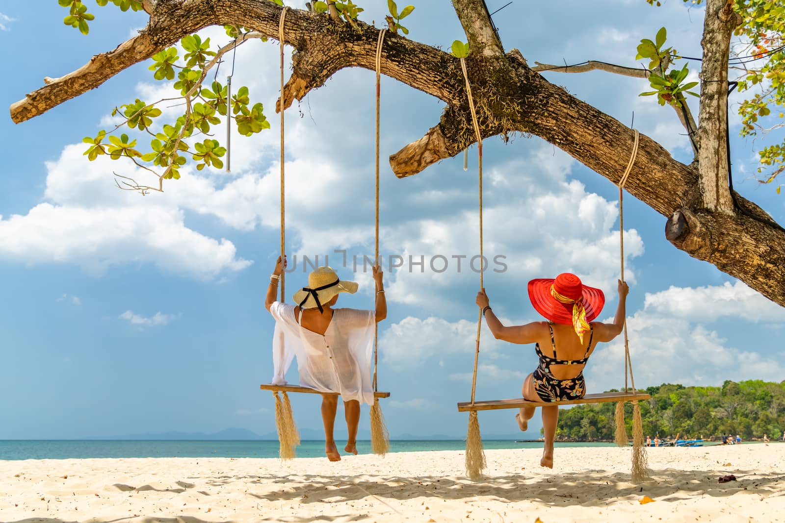 Woman at the beach in Thailand by Netfalls