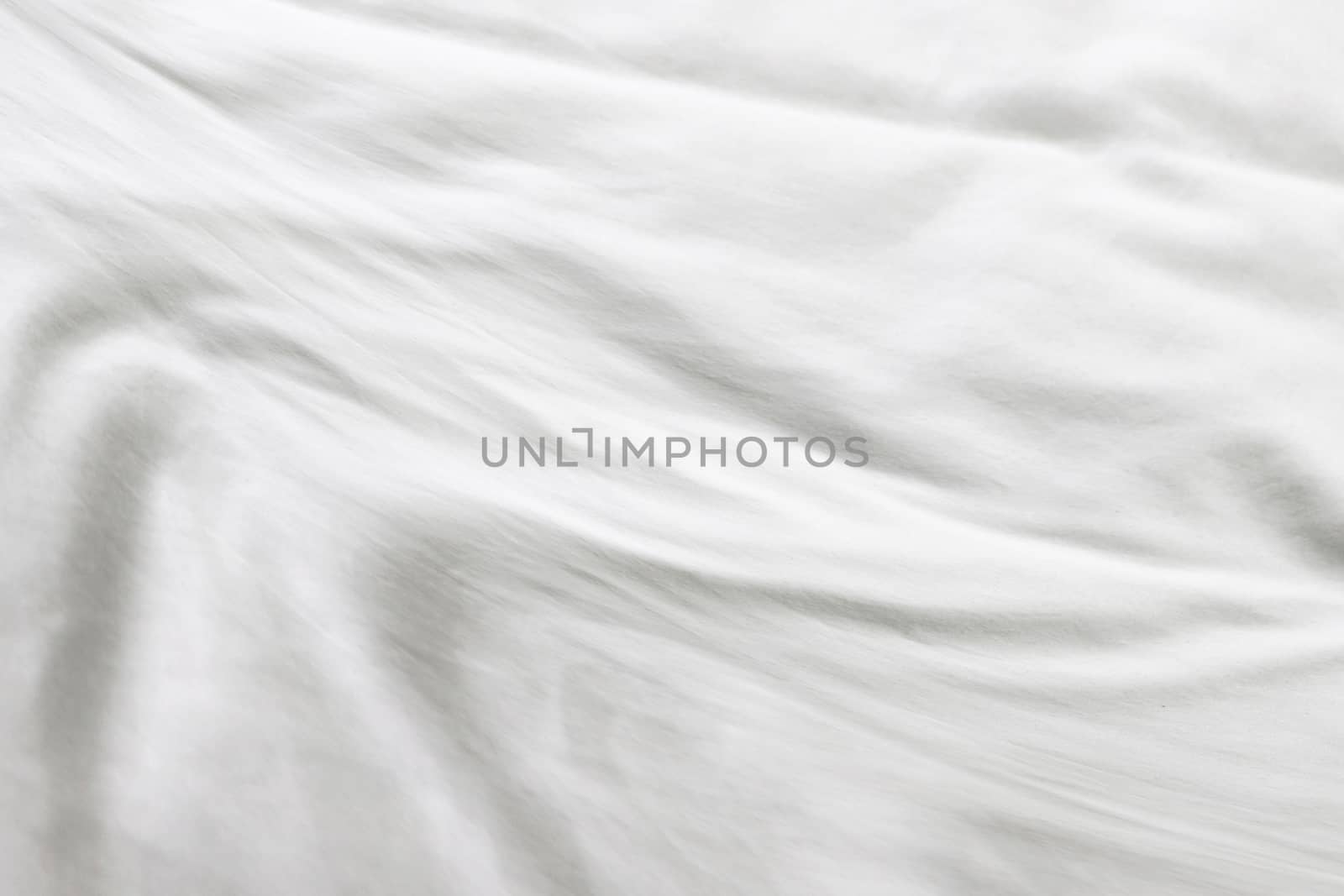 White cloth abstract background with smooth waves