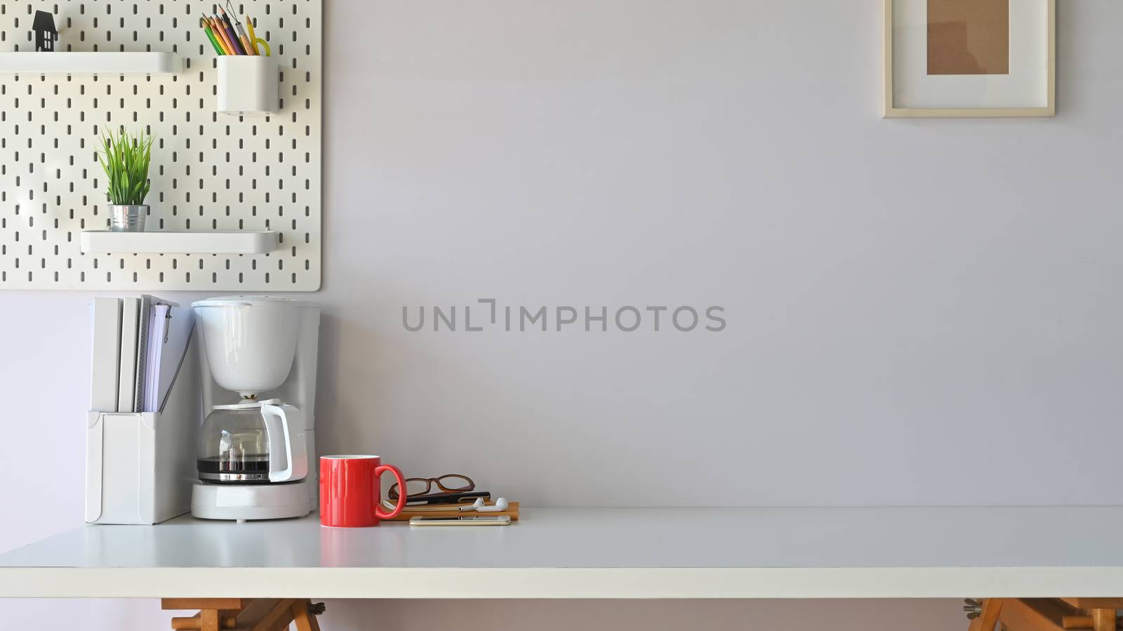 Photo of working desk in modern work place.Equipment on table. Morning workspace concept.