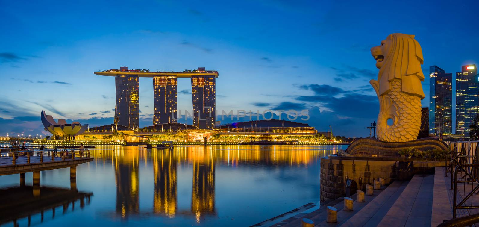 SINGAPORE CITY SINGAPORE: FEBRUARY 12 2020: Singapore Merlion Park downtown Singapore  business district at sunrise
