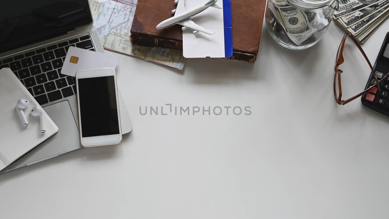 Travel stuff on the white table. Vacation travelling concept.