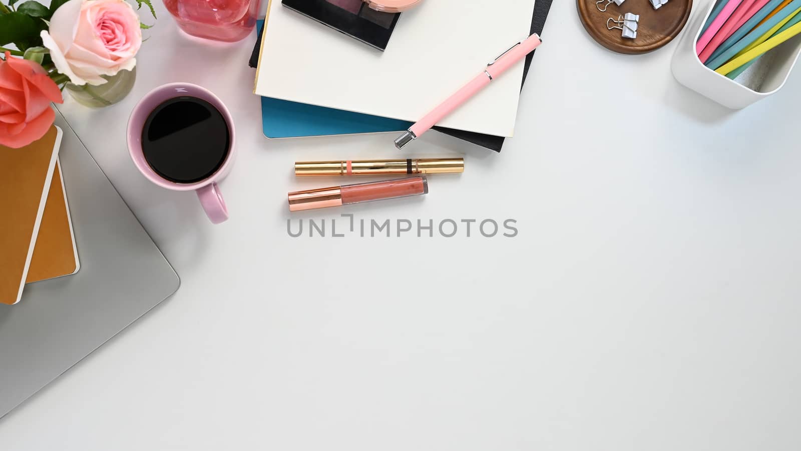 Above shot creative female desk, View from top of woman equipment putting on the white desk. Feminine working desk concept.