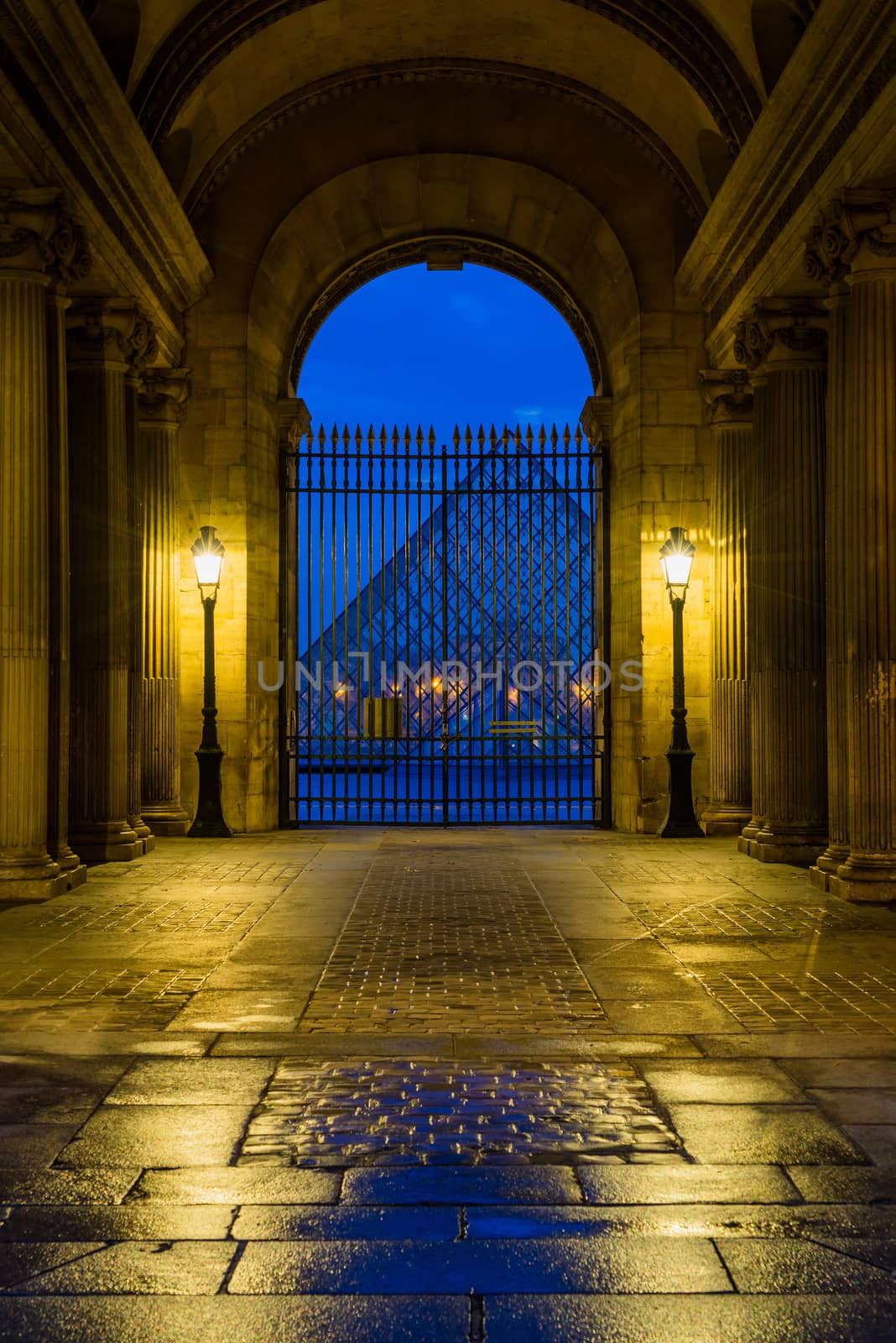 PARIS, FRANCE - DECEMBER 5 2018: Louvre Museum at night in Paris France - The world's most visited museum