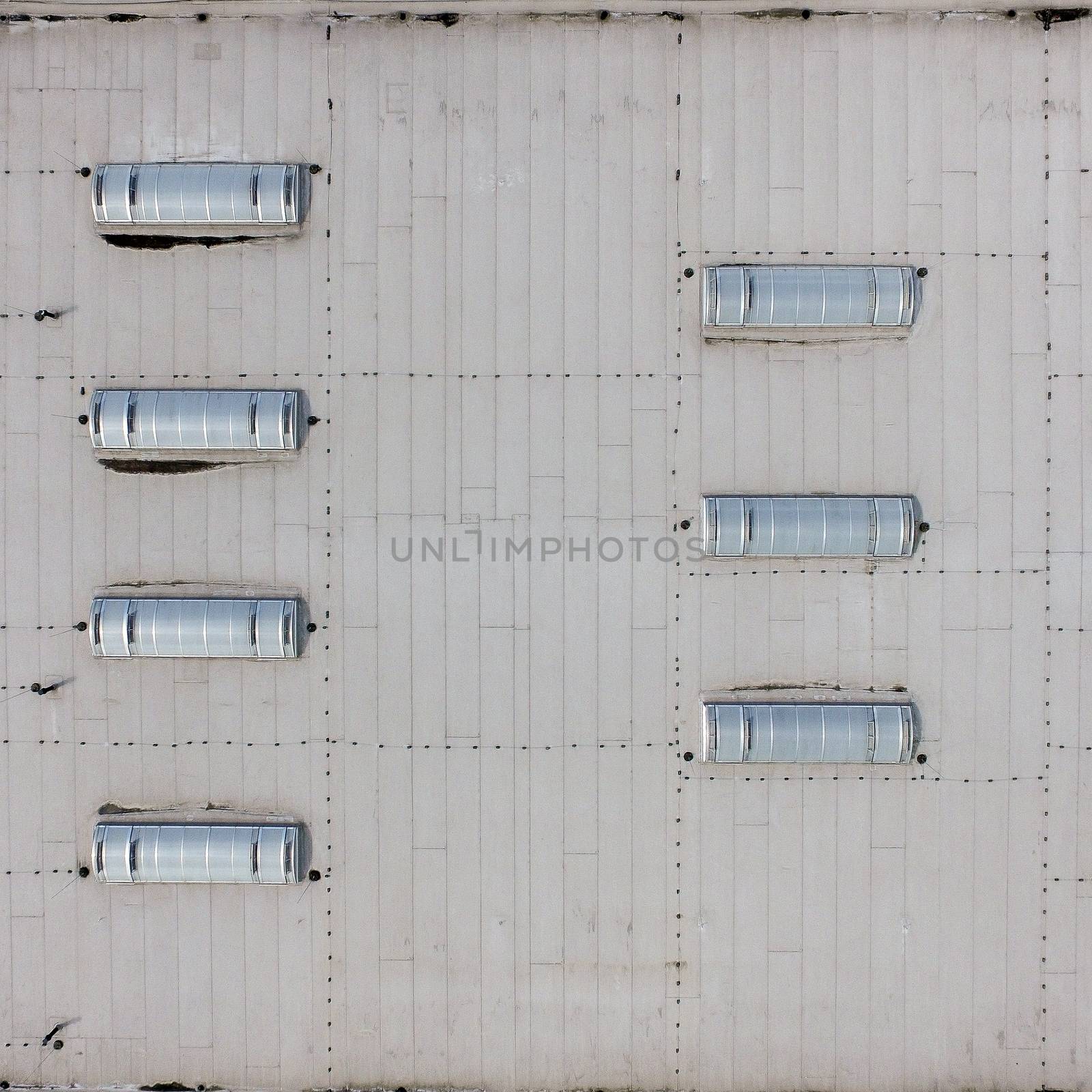 Aerial view of the flat roof of an industrial hall, as backgroun by geogif