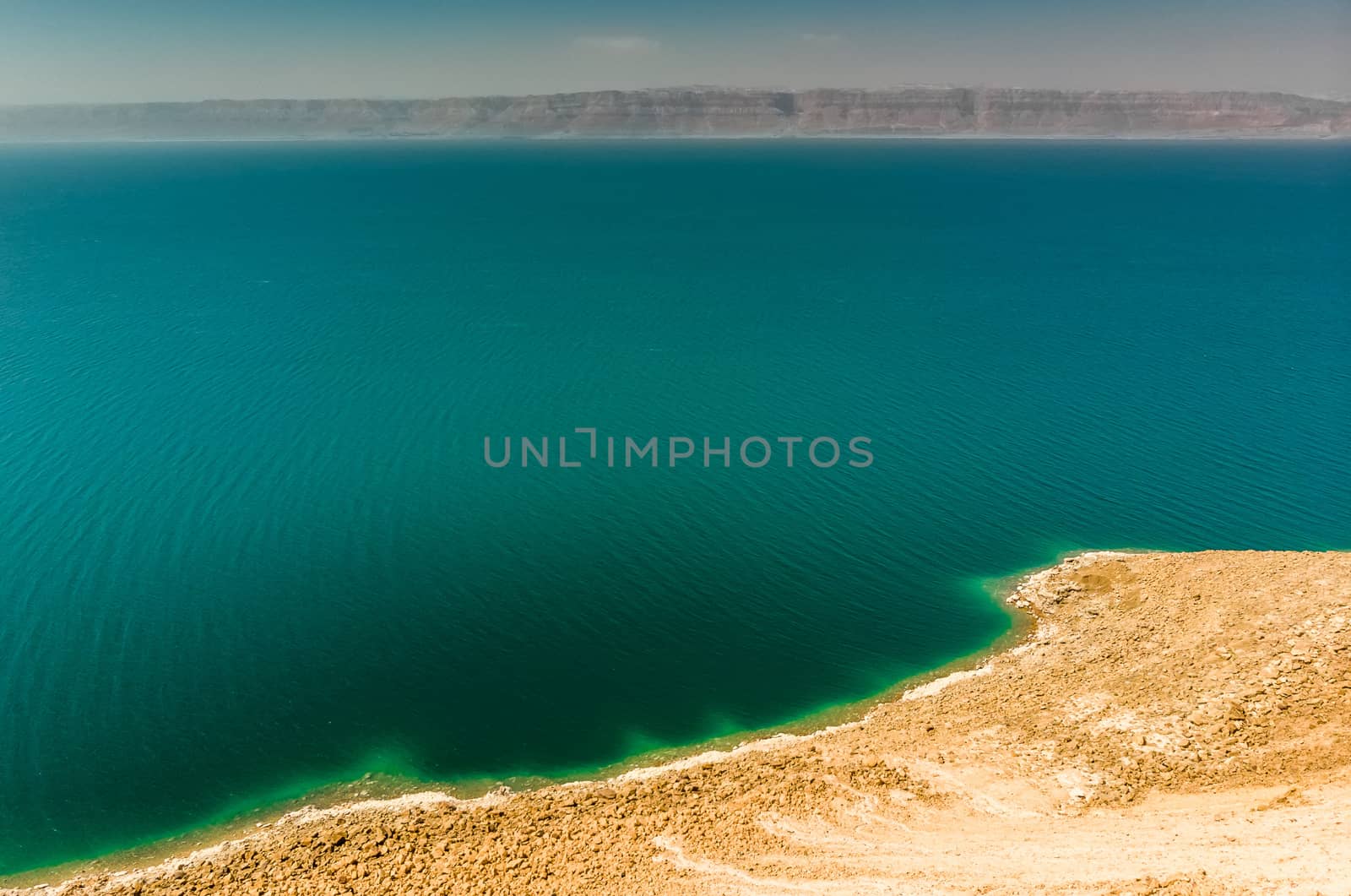 View from the Jordanian coast over the Dead Sea to the mountains on the west side in Israel by geogif