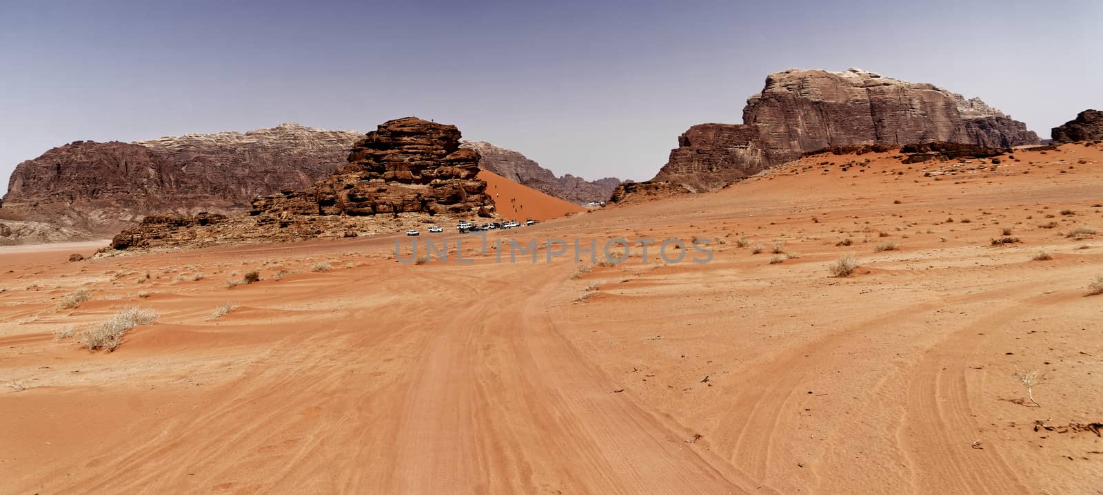 View to a camp for tourists in the desert of the nature reserve of Wadi Rum, Jordan by geogif