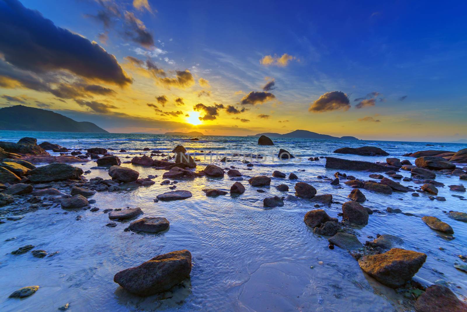 Beautiful colours of clouds and sky during sunrise at Rawai beach, Phuket, Thailand