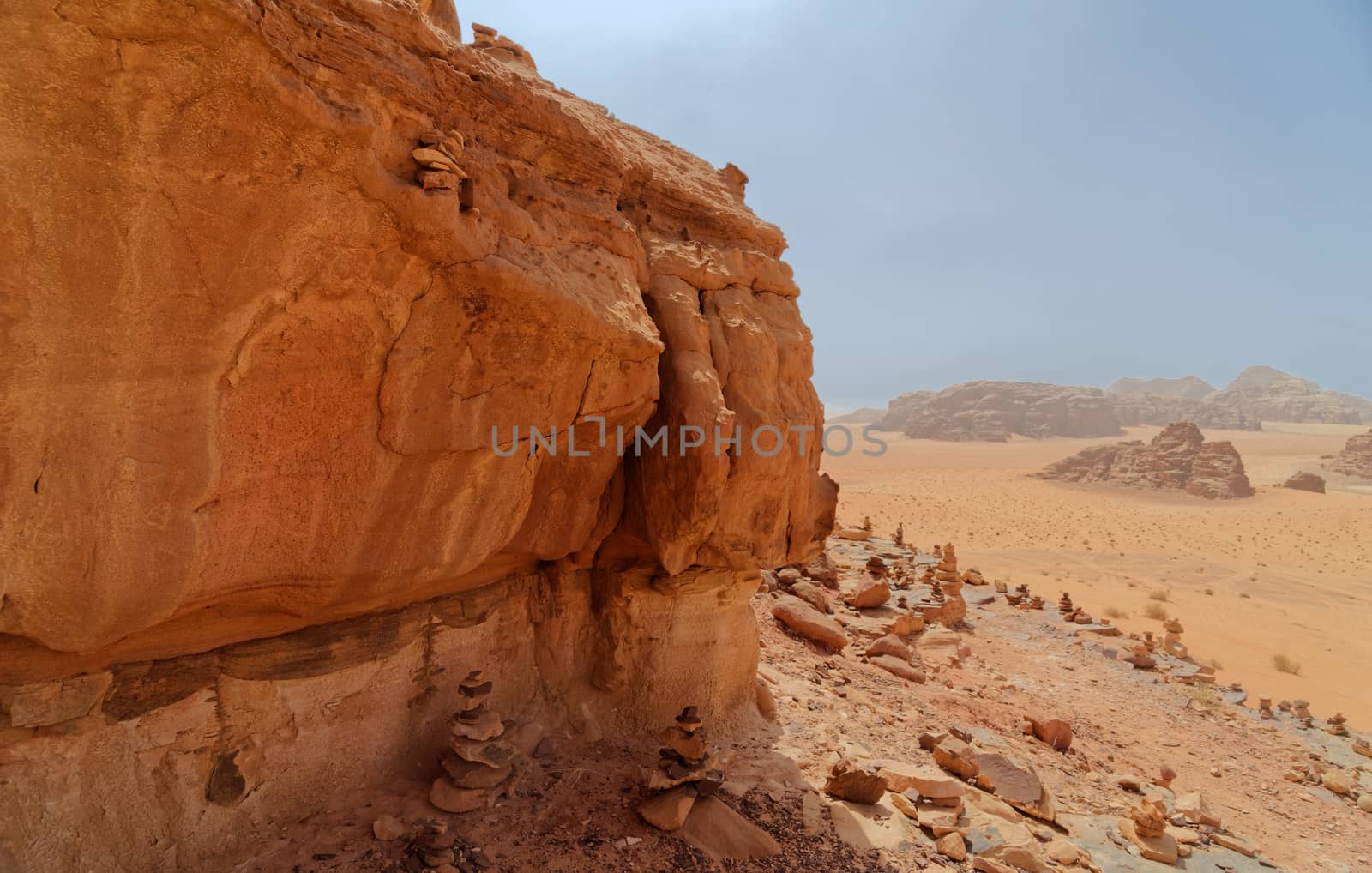 Composite panorama of high resolution aerial photos of a monolithic mountain in the central area of the desert reserve of Wadi Rum, Jordan, middle east
