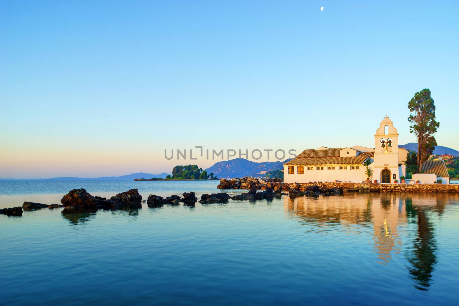 Corfu, Greece. Vlacherna Monastery on the Kanoni peninsula in Corfu at sunrise