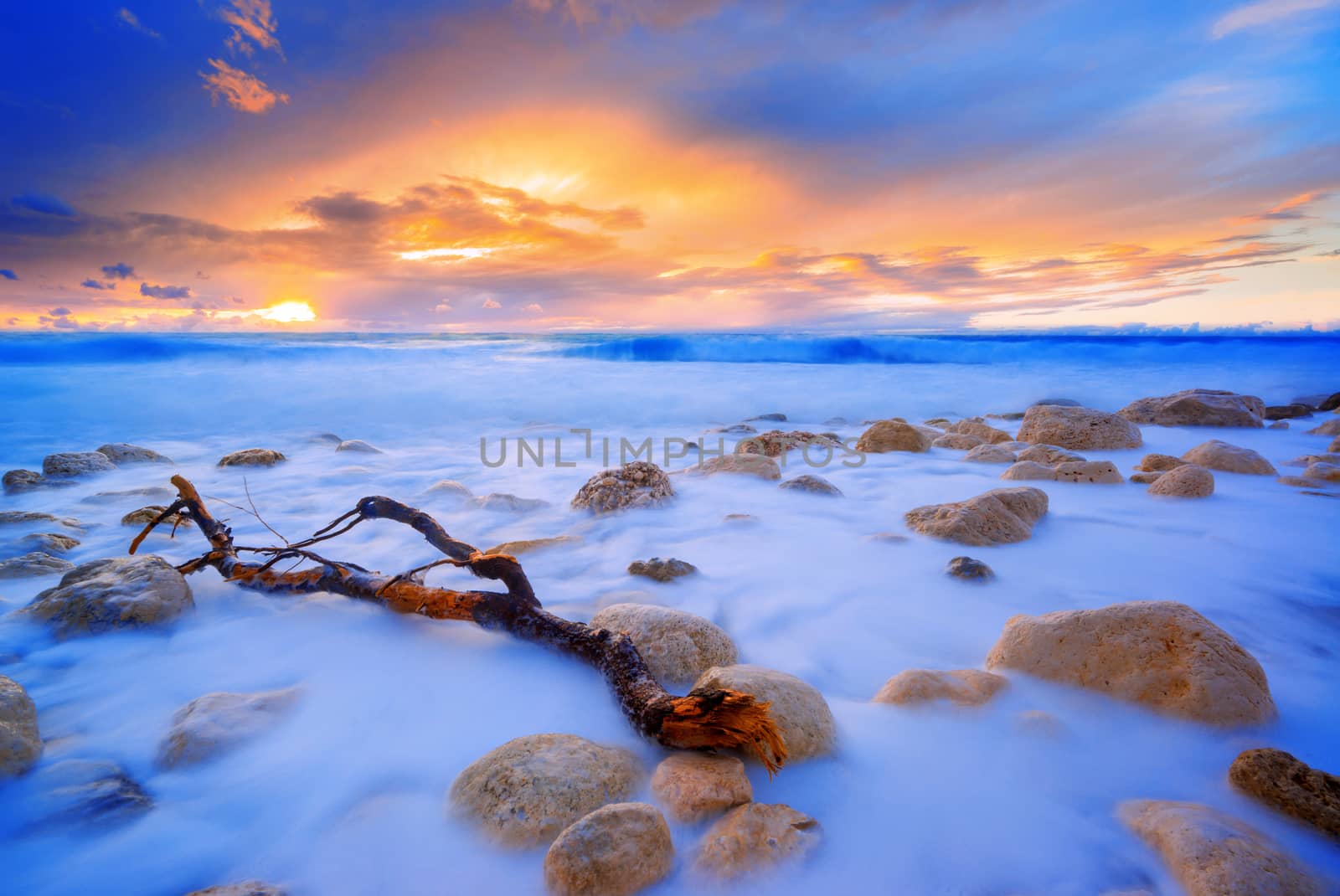 Pefkoulia beach in Lefkada Greece at sunset