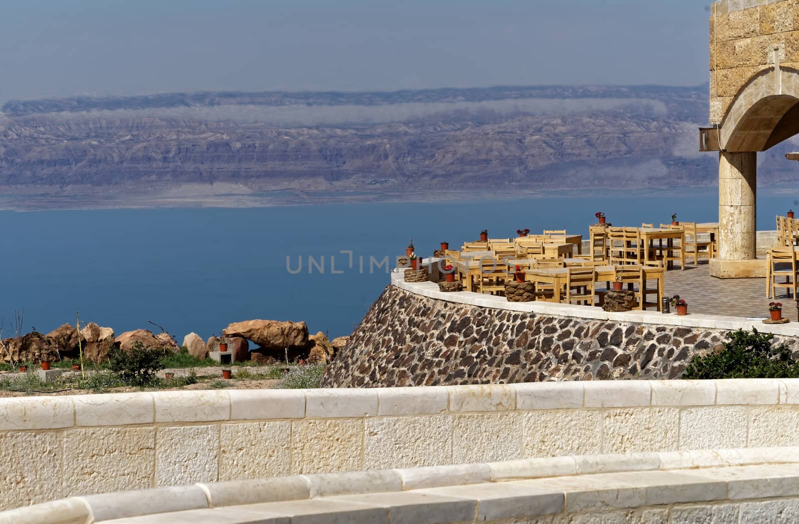 View over the terrace of the museum at the Dead Sea in Jordan with the mountains of Israel on the opposite bank, middle east