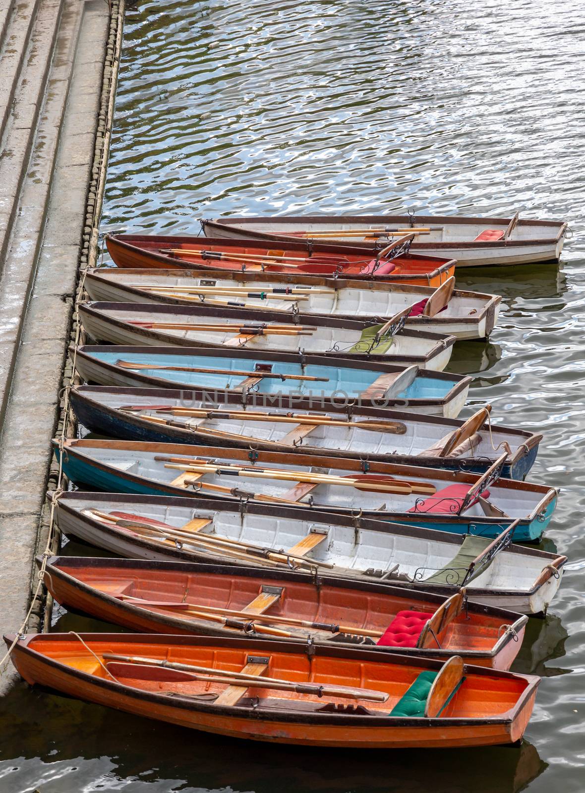 Wooden boats for hire moored on the River Thames by magicbones