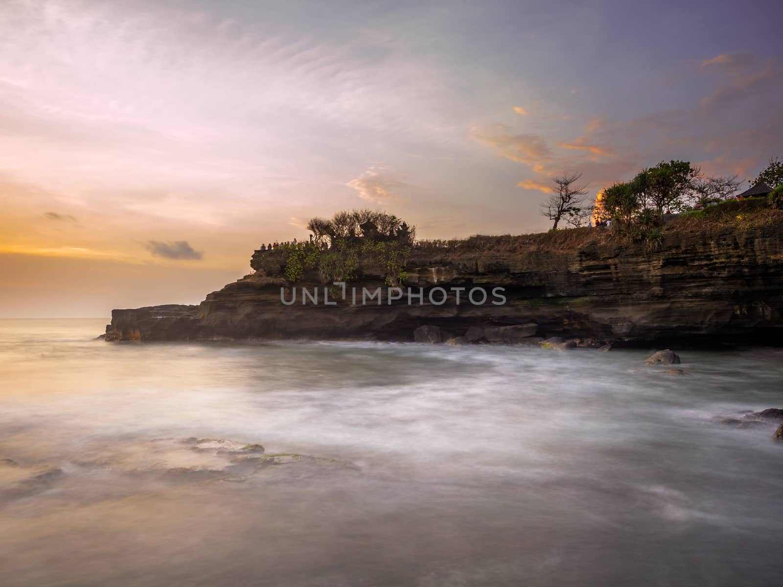 Temple in the sea Pura tanah lot Bali Indonesia at sunset