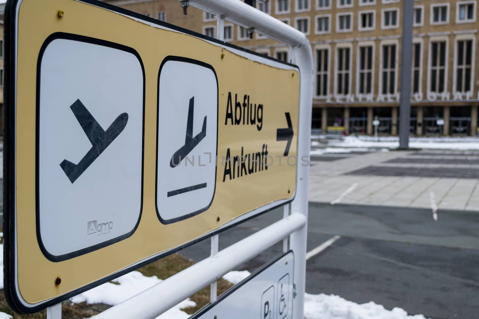 Berlin, Germany, February 2013: abflug ankunft, arrival departure directional sign outside of an airport