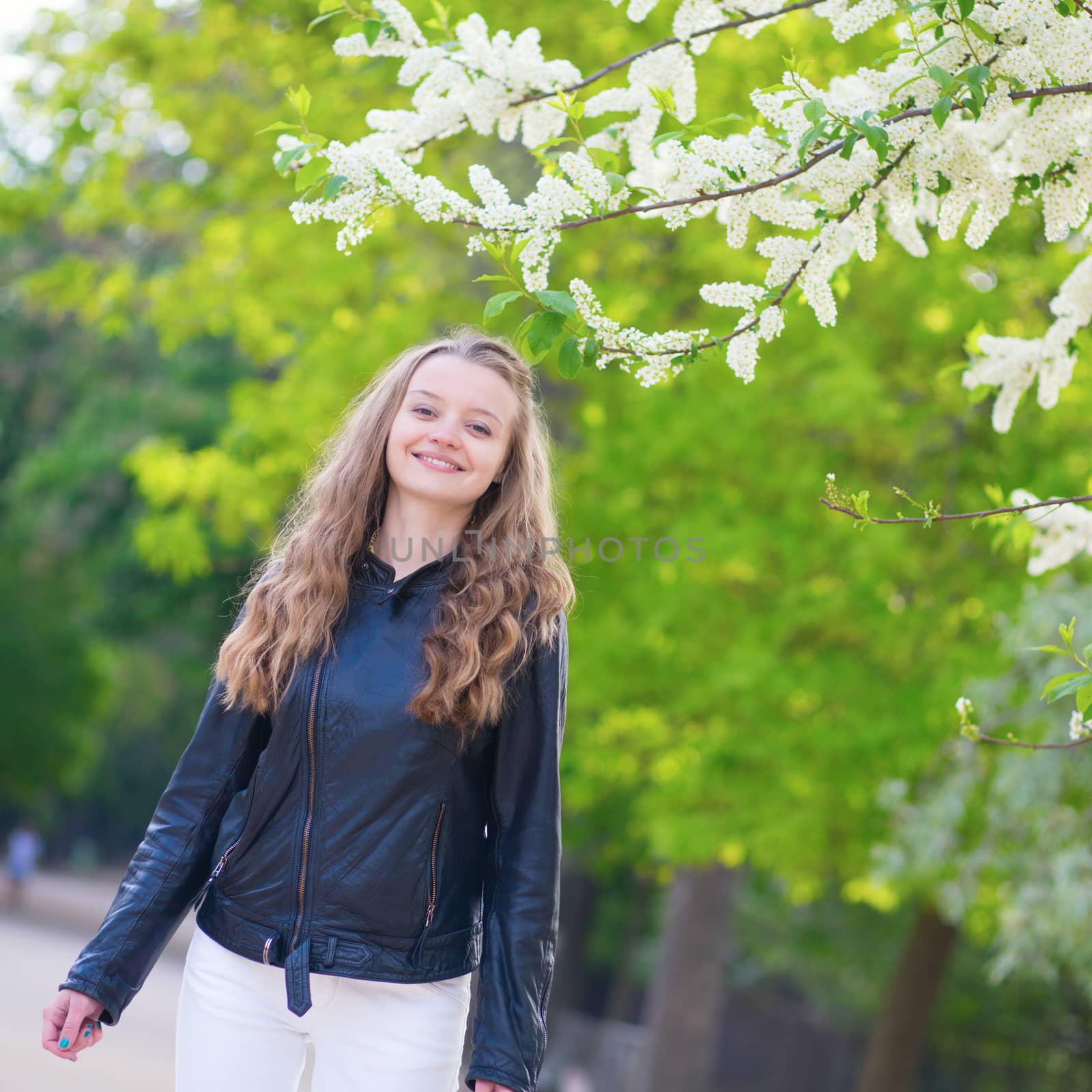 Girl in park on a spring day by jaspe