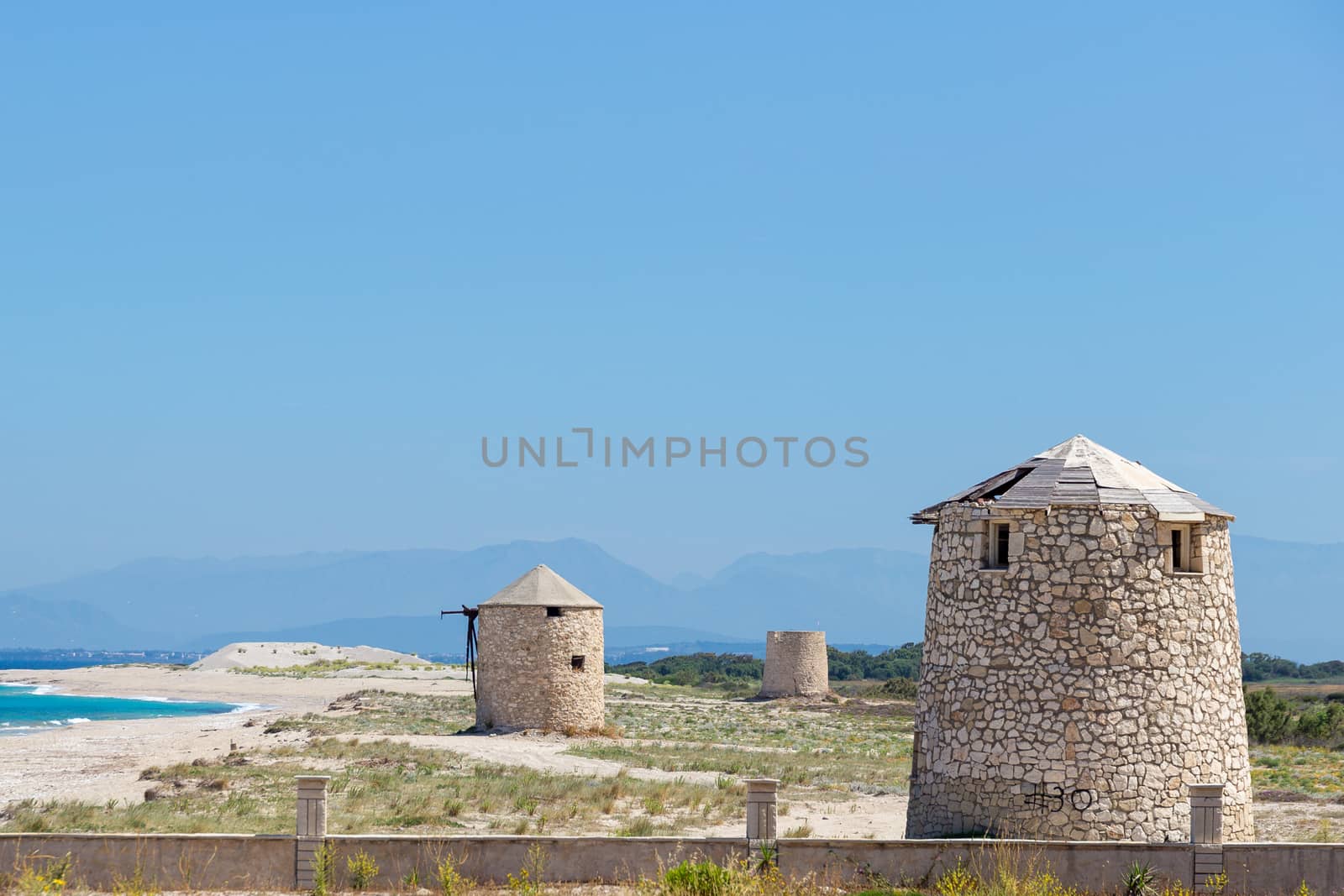 Ancient Windmills in Lefkada by magicbones