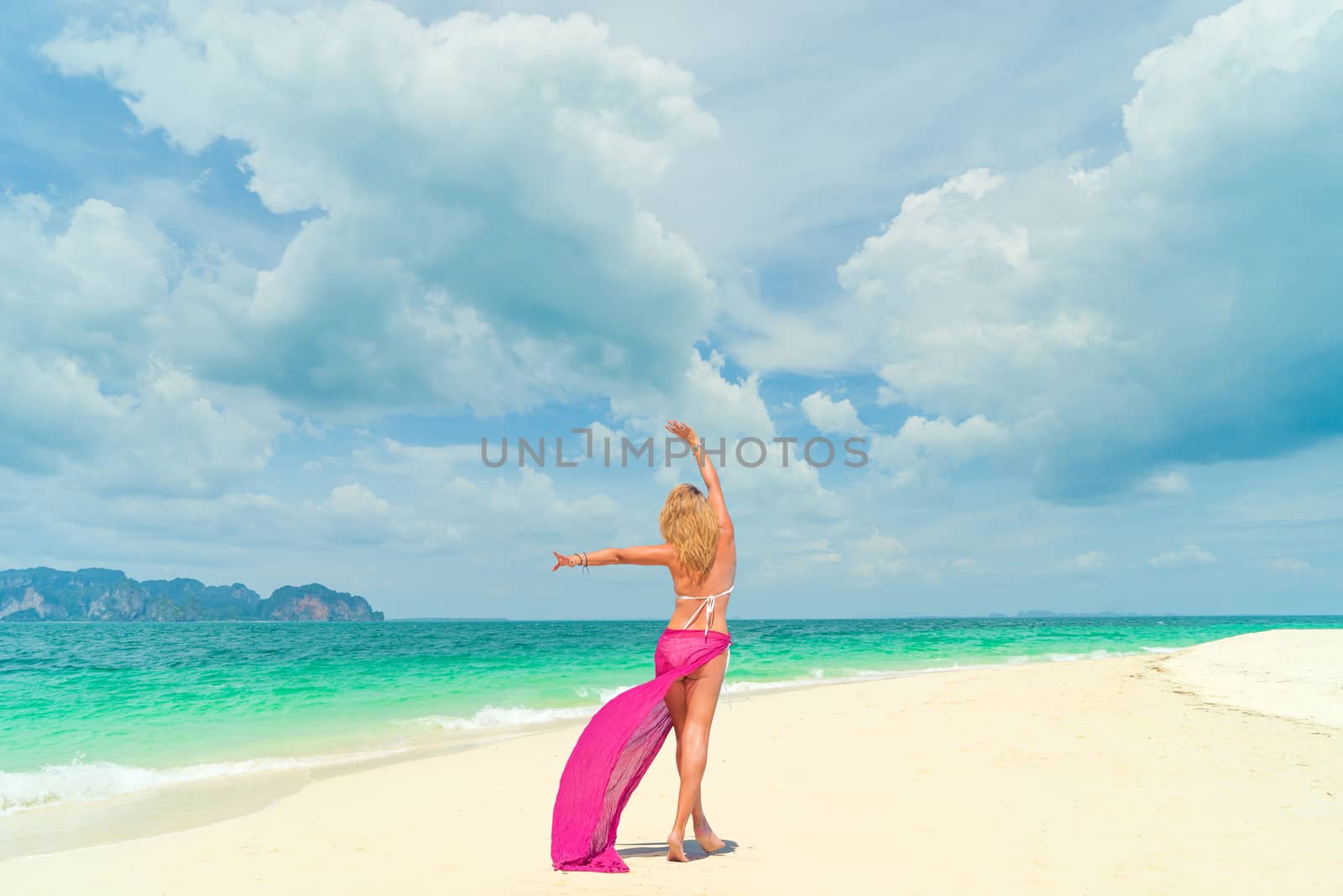 woman walking on tropical beach vacation. summer holiday travel 