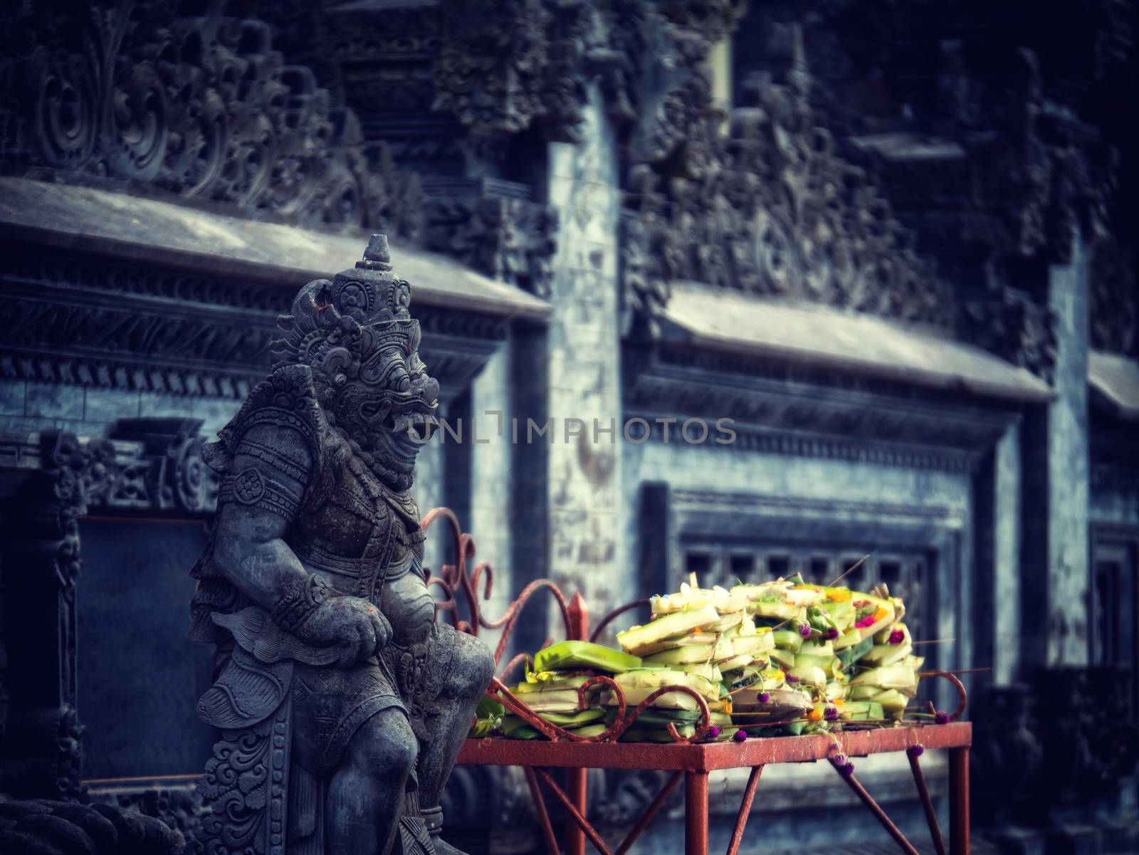 Gardian statue at the Bali temple entrance Indonesia