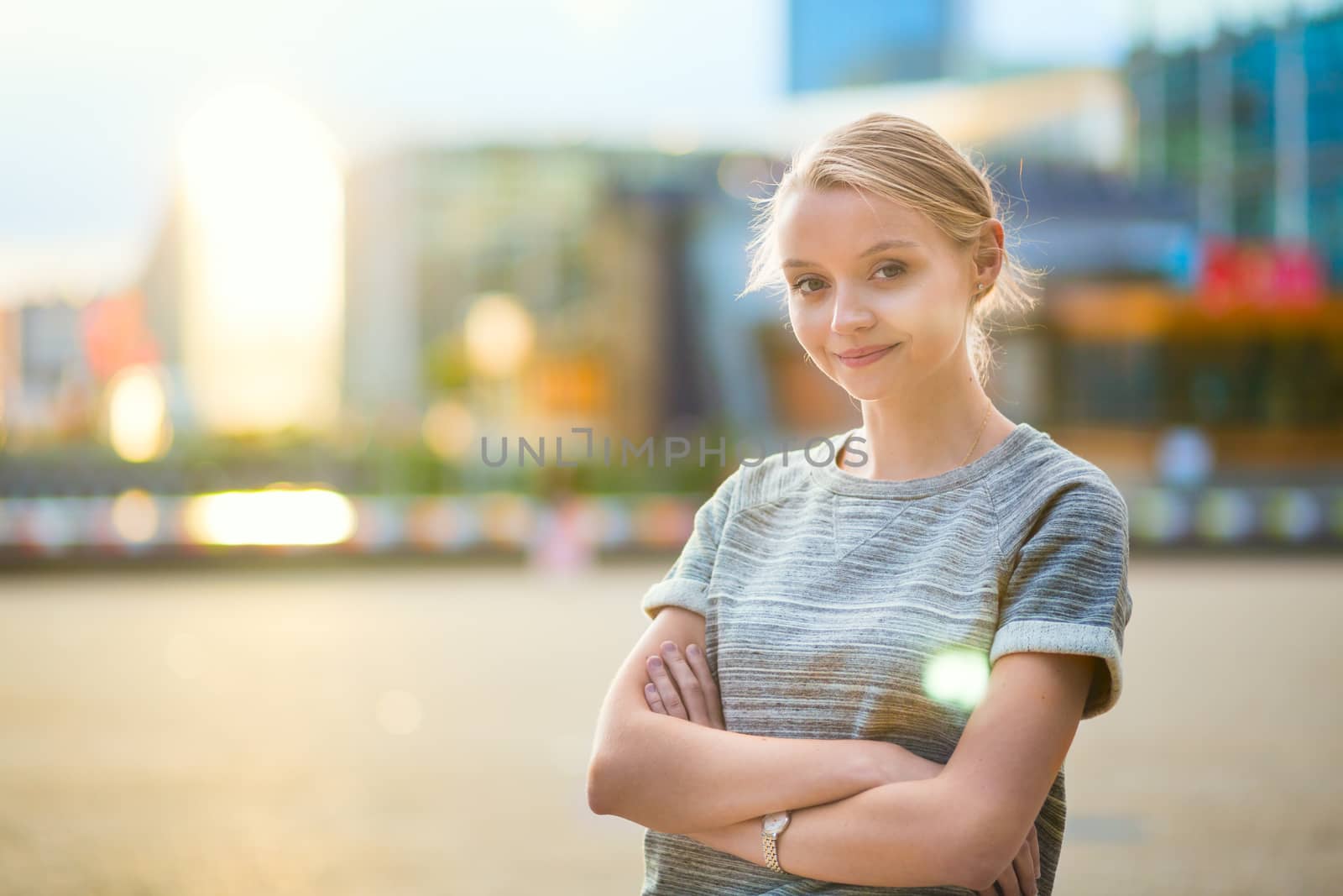 Girl walking at La Defense, business district of Paris