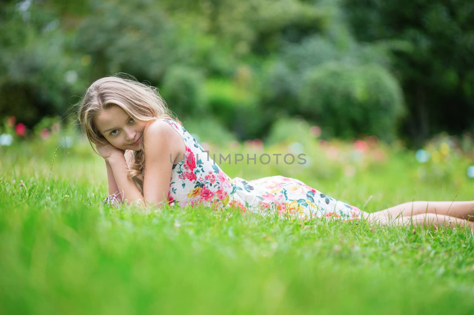 Young beautiful girl having a picnic in the countryside