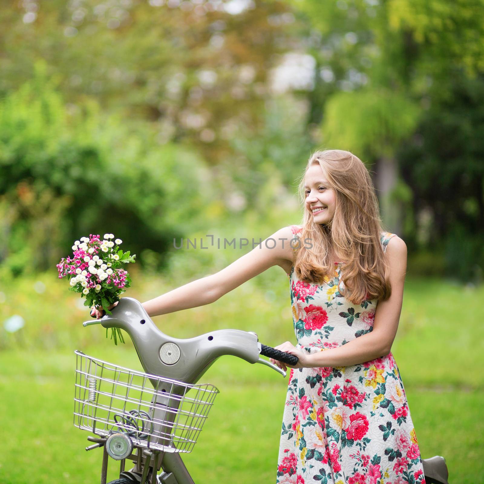 Happy girl with bicycle by jaspe