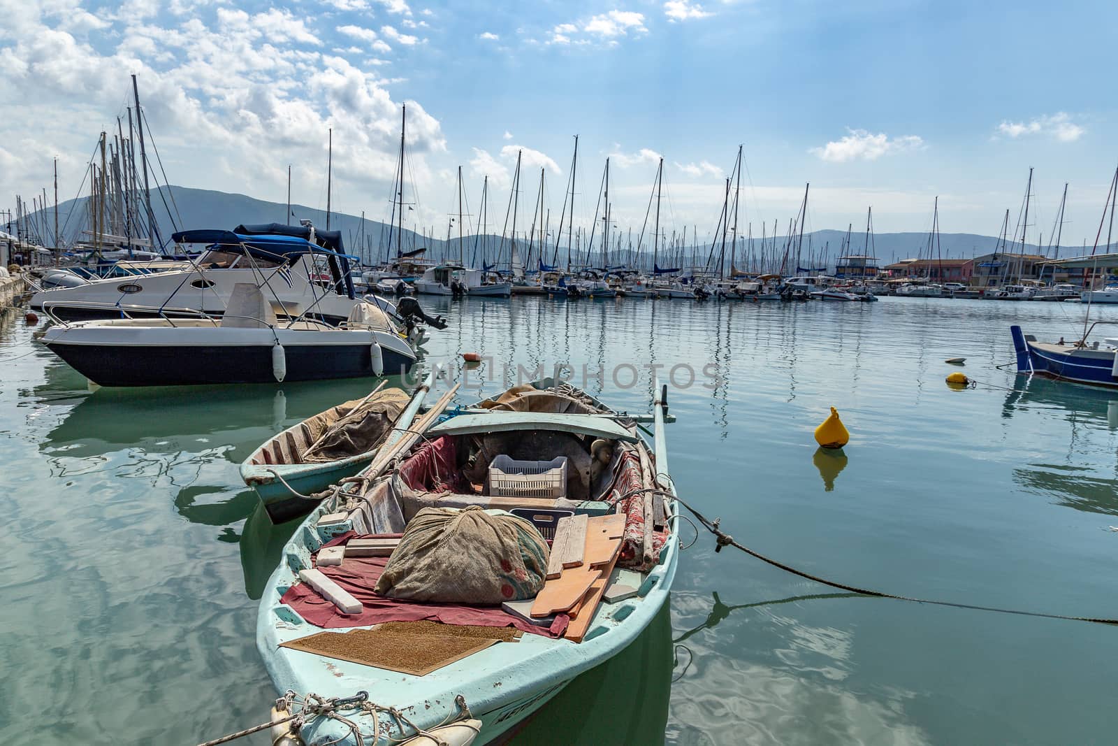 Docked sailboats in the small marina of Lefkas town, Lefkada, Gr by magicbones