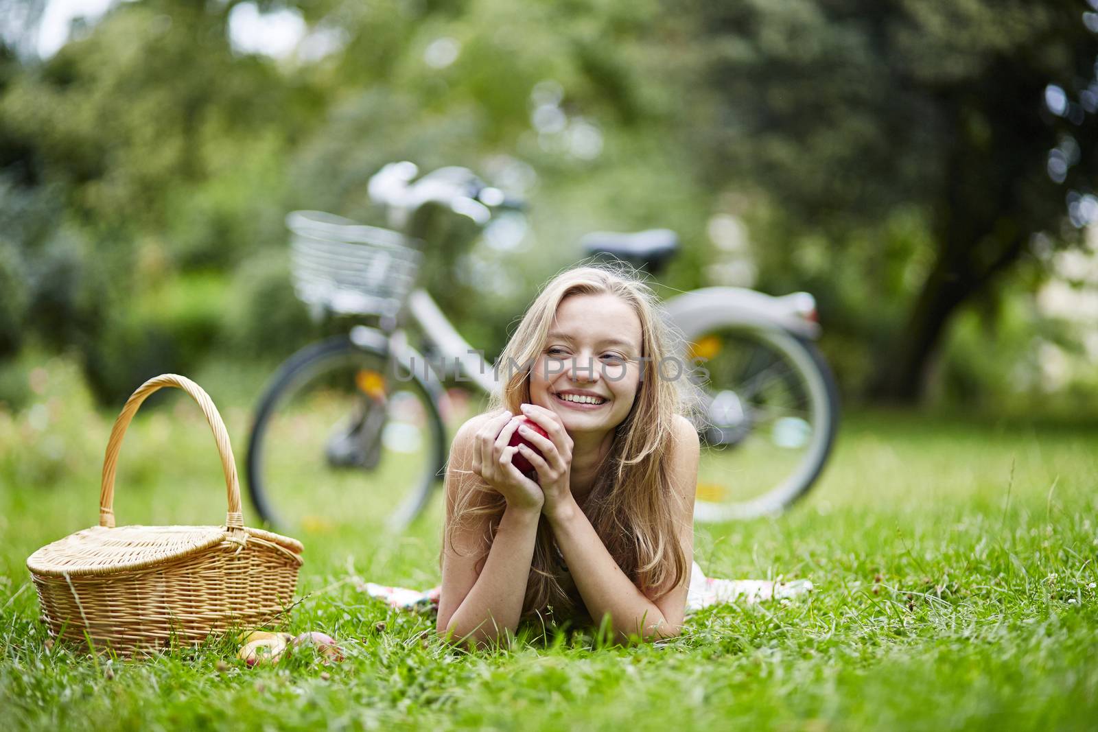 Beautiful young girl spending her time in the countryside