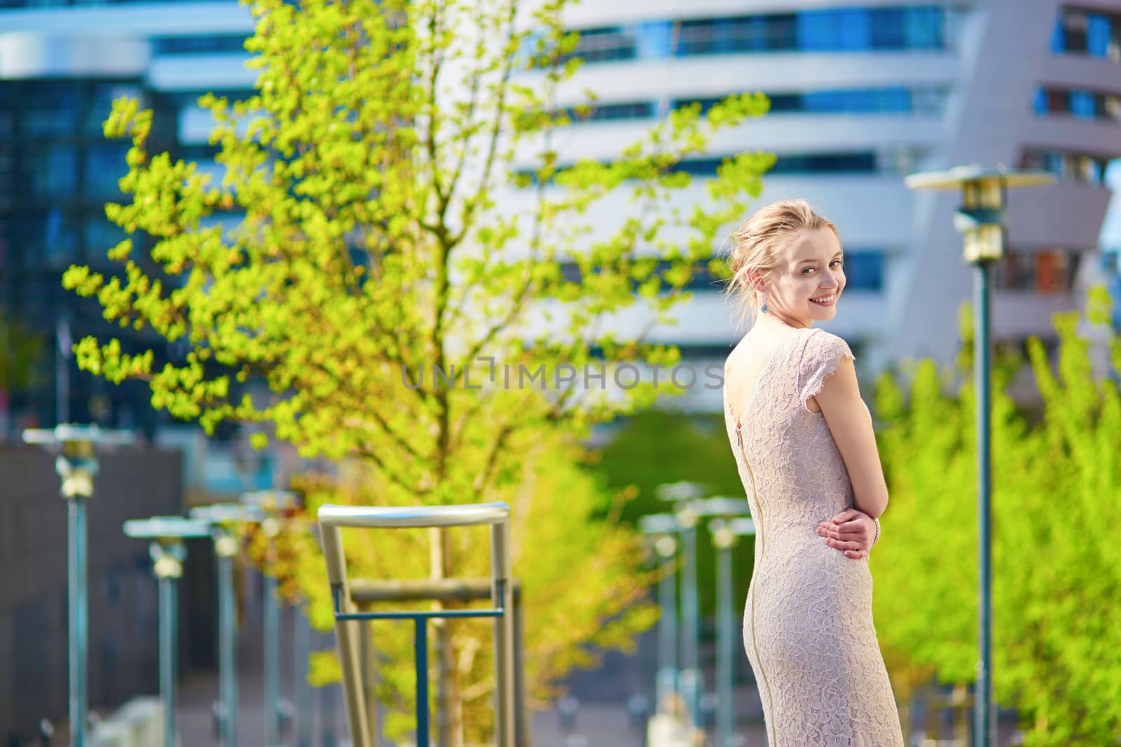 Beautiful young woman outdoors on a spring day