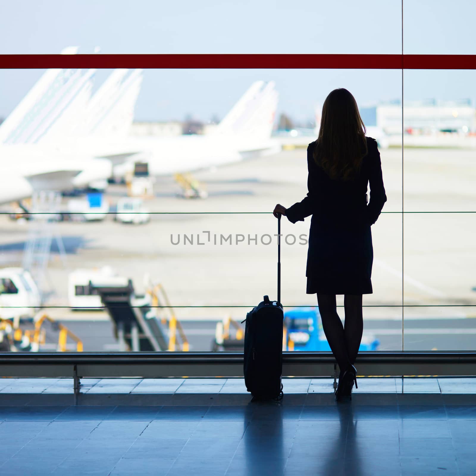 Woman in international airport by jaspe