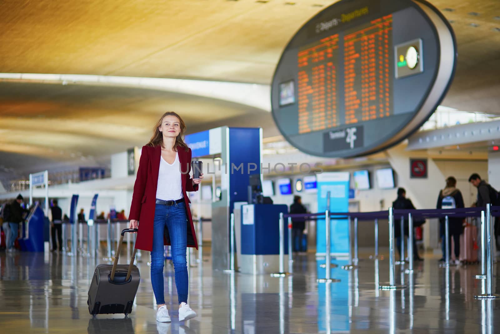 Young woman in international airport by jaspe