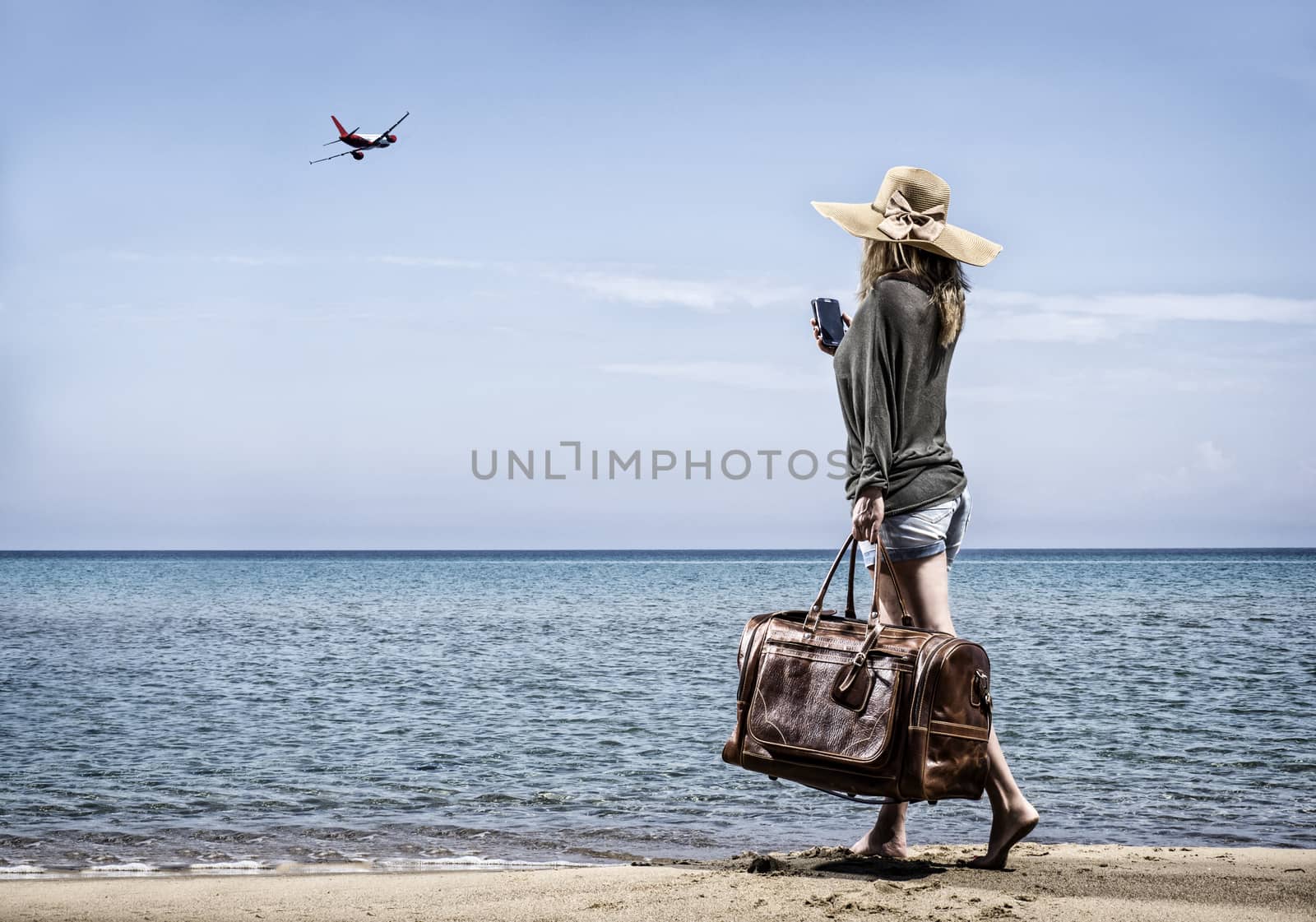 Woman on the beach by Netfalls