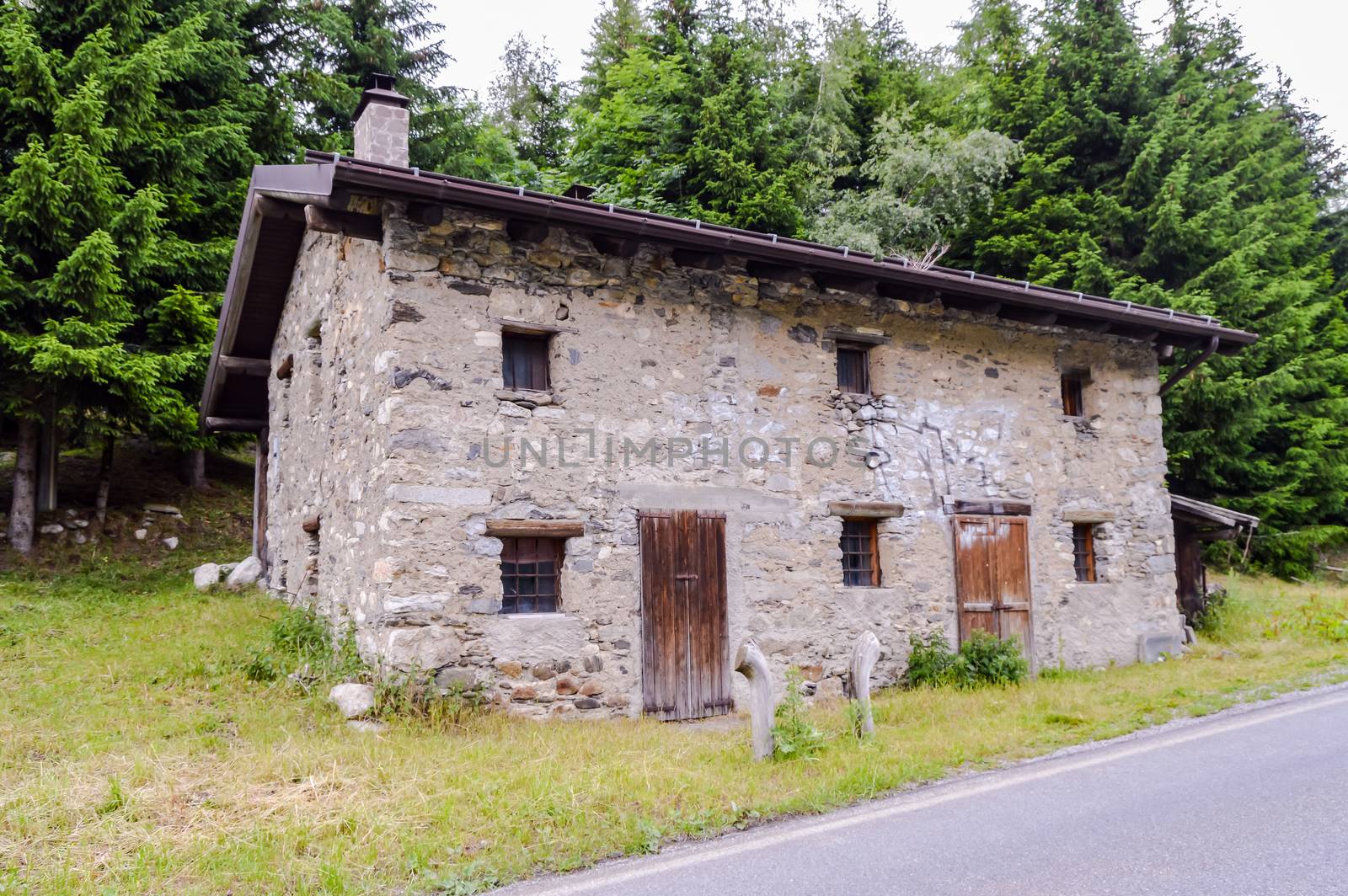 Old local stone mountain chalet the Italian Alps