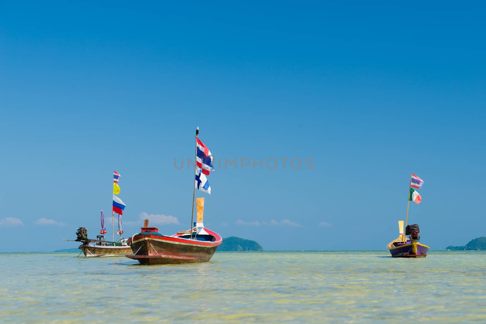 Traditional thai longtail boat at famous sunny Long Beach, Thailand, Koh Phi Phi Don, Krabi province, Andaman sea