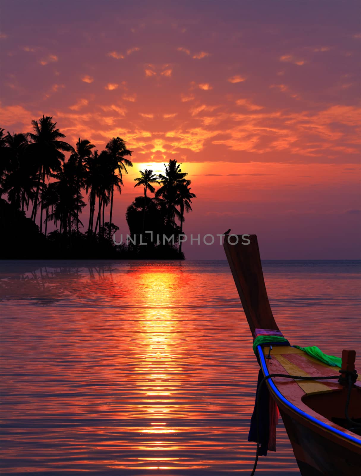 Beautiful sunrise in Rawai Phuket island Thailand with Long tailed boat Ruea Hang Yao