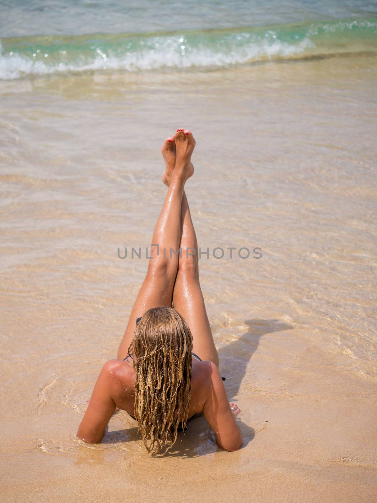 Beautiful woman on the beach in Phuket Thailand.