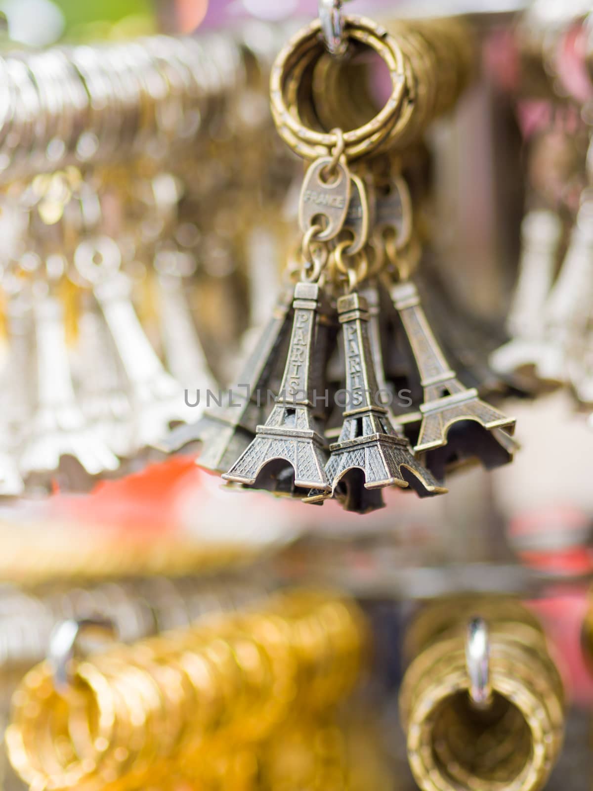 Eiffel tower key chains at the shop in Paris  by Netfalls