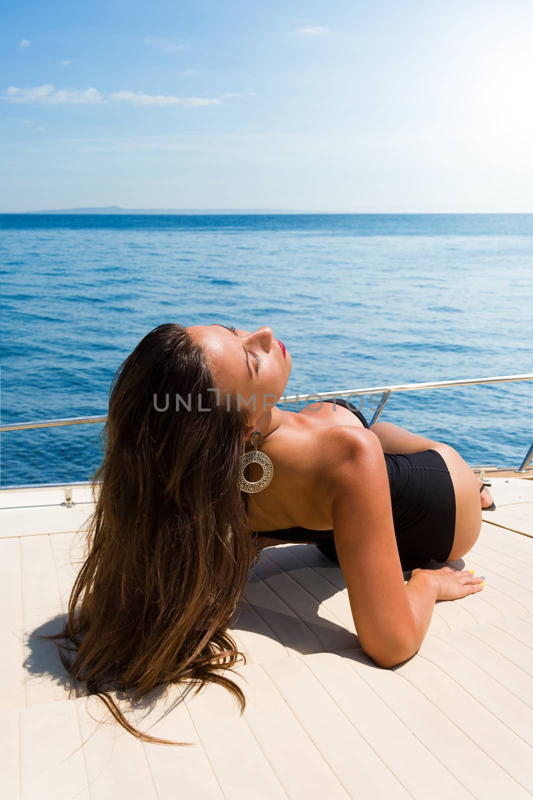 Young woman Sailing On Yacht