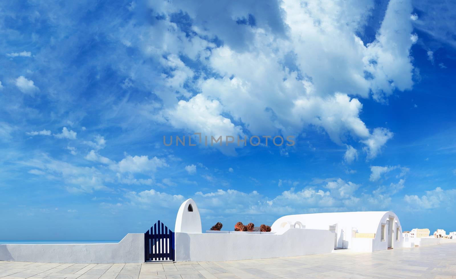 Panoramic view of a Classical Greek architecture of the streets in the Cyclades Greece