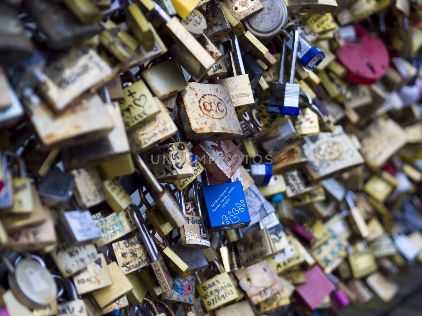 PARIS - DEC 6: Love Padlocks at Pont de l'Archevche on December 6, 2013, in Paris. The thousands of locks of loving couples symbolize love forever.