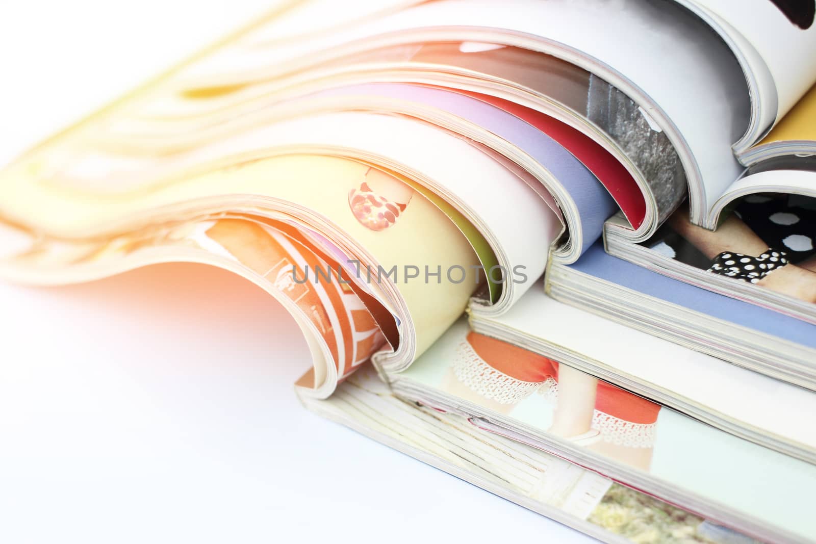 stack of magazines on white background