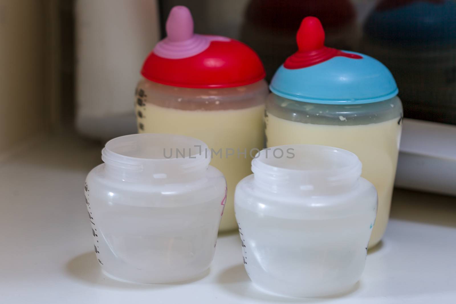 Two baby milk bottles by magicbones