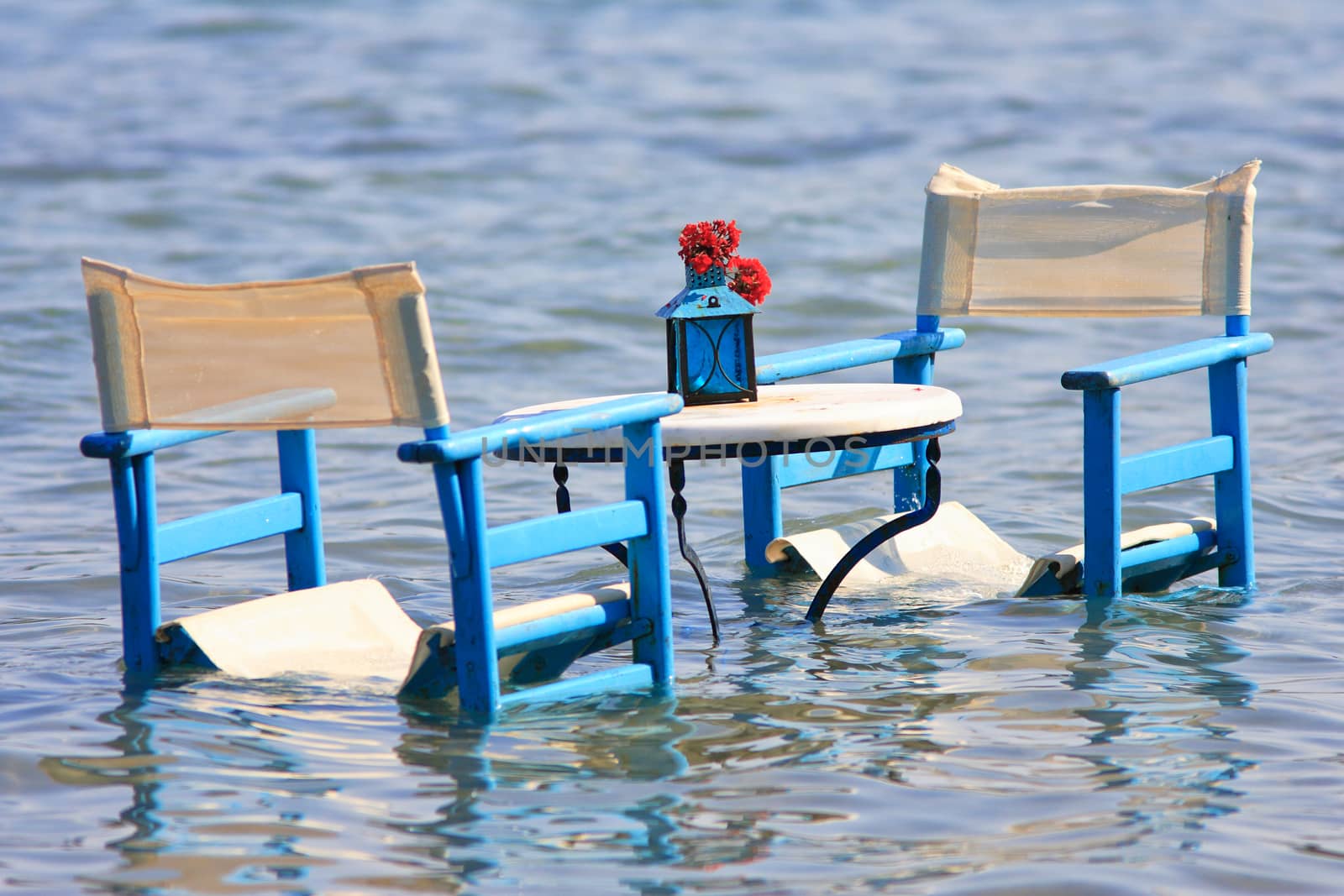 Table in the sea for romantic dinner