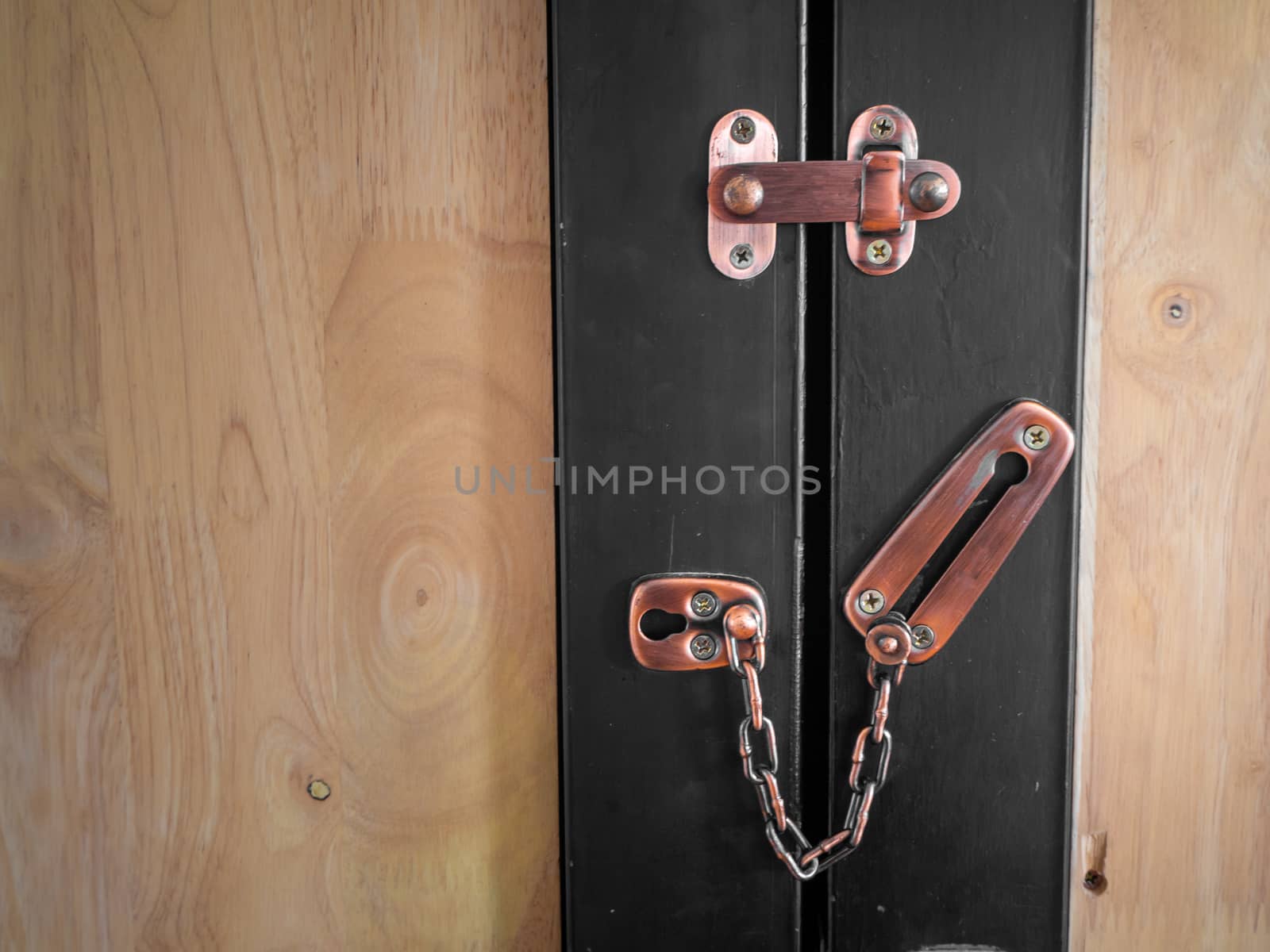 New brown modern wooden door lock in house interior