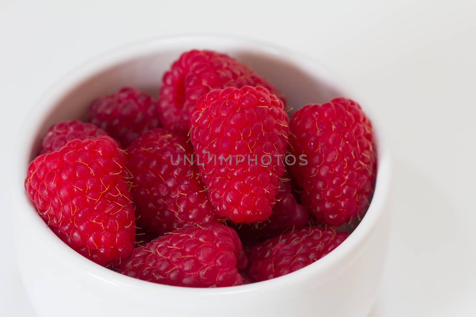 A Bowl of Raspberries, close up by magicbones