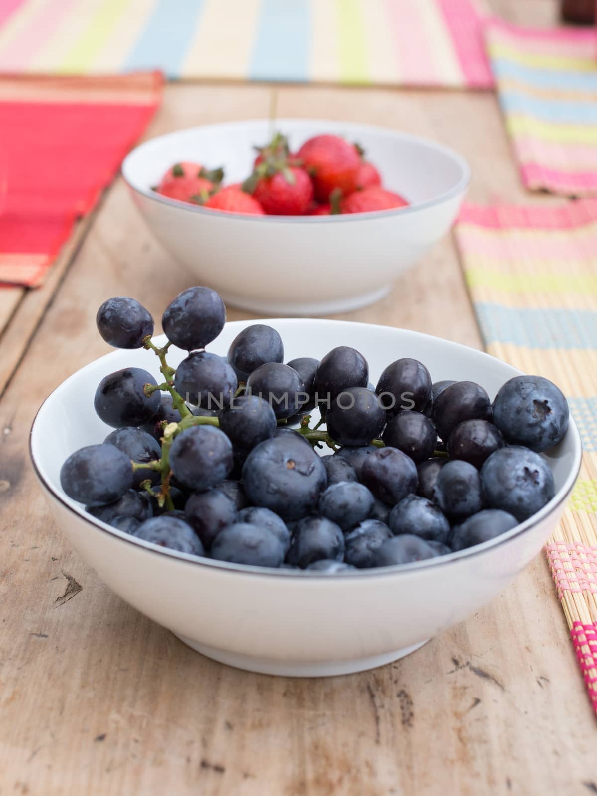 Bowl of ripe blueberries by magicbones