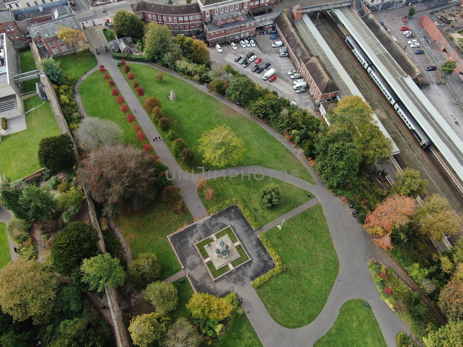 a drone shot of Exeter City centre in Devon , UK, showing Exeter Central station and Northenhay Gardens