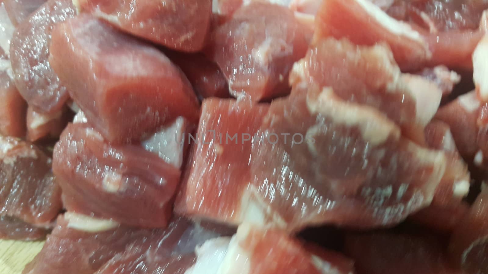 Red meat small steaks with whitish meat fat. by Photochowk